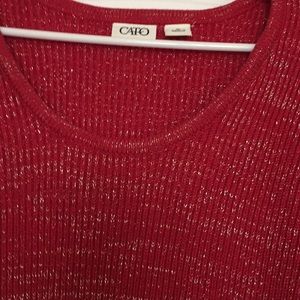 Red tunic with silver threading.